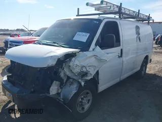 2017 Chevrolet Express Cargo Van with VIN 1GCWGAFF8H1139628, listed as a IAAI auction lot 41673116 with 173,895 mi miles. Bid and sale history available at carsss.com. Image 2.