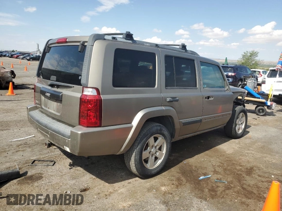 2006 Jeep Commander with VIN 1J8HG48K06C319278, listed as a Copart auction lot 60560225 with 122,920 mi miles and Salvage title. Bid and sale history available at DreamBid. Image 3.