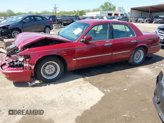 2002 Mercury Grand Marquis LS Premium z VIN 2MEFM75W22X653775, wystawiony jako IAAI lot #42225138 z przebiegiem 124 749 mil mil oraz . Historia ofert i sprzedaży dostępna na DreamBid. Obrazek 17.
