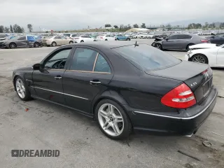 2005 Mercedes-Benz E-Class 5.5L AMG with VIN WDBUF76J85A704293, listed as a Copart auction lot 50822035 with 171,014 mi miles and Salvage Title. Bid and sale history available at carsss.com. Image 2.