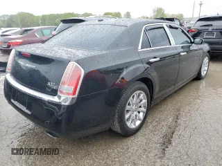 2013 Chrysler 300 with VIN 2C3CCAET1DH568910, listed as a Copart auction lot 50037004 with 136,228 mi miles and Salvage Title. Bid and sale history available at carsss.com. Image 3.