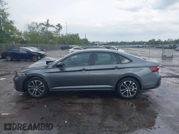 2023 Volkswagen Jetta Sport with VIN 3VWBM7BU8PM005151, listed as a IAAI auction lot 41886412 with 23,351 mi miles and . Bid and sale history available at DreamBid. Image 14.