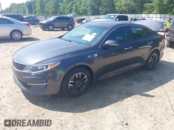 2018 Kia Optima LX z VIN KNAGT4L34J5232346, wystawiony jako IAAI lot #42136524 z przebiegiem 119 977 mil mil oraz . Historia ofert i sprzedaży dostępna na DreamBid. Obrazek 17.
