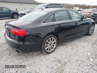 2013 Audi A6 3.0T Prestige with VIN WAUHGAFCXDN053087, listed as a IAAI auction lot 40840631 with 62,567 mi miles. Bid and sale history available at carsss.com. Image 4.