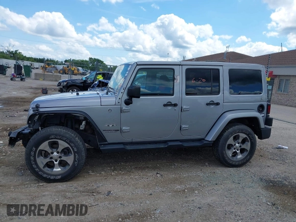 2018 Jeep Wrangler Unlimited Sahara with VIN 1C4BJWEGXJL806832, listed as a IAAI auction lot 42605892 with 90,535 mi miles and . Bid and sale history available at DreamBid. Image 14.