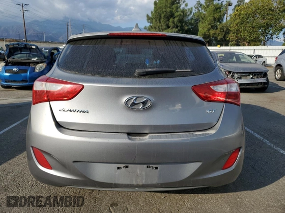 2013 Hyundai Elantra GT with VIN KMHD35LE2DU098164, listed as a Copart auction lot 77272174 with 165,061 mi miles and Salvage Title. Bid and sale history available at carsss.com. Image 6.