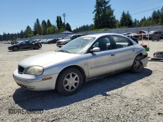 2003 Mercury Sable LS Premium z VIN 1MEHM55S63G632882, wystawiony jako Copart lot #64314465 z przebiegiem 99 207 mil mil oraz Szkoda całkowita • Salvage title. Historia ofert i sprzedaży dostępna na DreamBid. Obrazek 1.