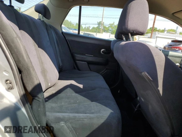 2007 Nissan Versa SL z VIN 3N1BC11E77L451507, wystawiony jako Copart lot #59663715 z przebiegiem 132 363 mil mil oraz Szkoda całkowita • Salvage title. Historia ofert i sprzedaży dostępna na DreamBid. Obrazek 10.