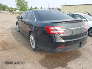 2014 Ford Taurus Limited with VIN 1FAHP2F88EG171235, listed as a IAAI auction lot 42402720 with 79,951 mi miles and . Bid and sale history available at DreamBid. Image 3.
