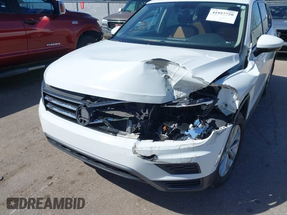 2019 Volkswagen Tiguan SE with VIN 3VV2B7AX8KM193166, listed as a IAAI auction lot 41957720 with 61,981 mi miles and . Bid and sale history available at DreamBid. Image 6.