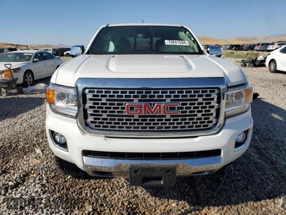 2017 GMC Canyon 4WD Denali with VIN 1GTP6EE11H1291755, listed as a Copart auction lot 70841594 with 89,609 mi miles and Salvage Title. Bid and sale history available at carsss.com. Image 5.