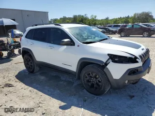 2016 Jeep Cherokee Trailhawk with VIN 1C4PJMBS5GW246289, listed as a Copart auction lot 52112995 with 69,813 mi miles and Salvage Title. Bid and sale history available at carsss.com. Image 4.