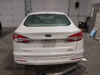 2019 Ford Fusion Hybrid SEL with VIN 3FA6P0MU8KR272811, listed as a IAAI auction lot 41705282 with 56,565 mi miles. Bid and sale history available at carsss.com. Image 16.
