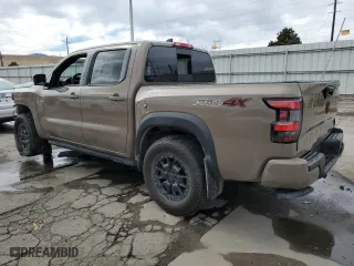 2023 Nissan Frontier PRO-4X with VIN 1N6ED1EK5PN641391, listed as a Copart auction lot 46895485 with 17,465 mi miles and Salvage Title. Bid and sale history available at carsss.com. Image 2.