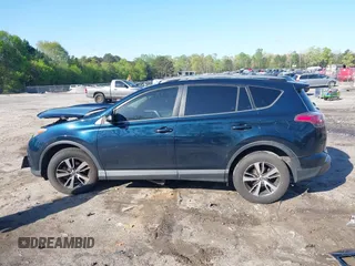 2018 Toyota RAV4 XLE with VIN JTMWFREV5JJ739619, listed as a IAAI auction lot 42017343 with 126,810 mi miles and . Bid and sale history available at DreamBid. Image 15.