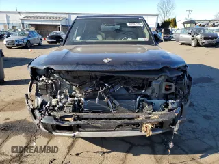 2023 Rivian R1S Adventure with VIN 7PDSGABA2PN014942, listed as a Copart auction lot 88597535 with 0 mi miles and Salvage Title. Bid and sale history available at carsss.com. Image 5.