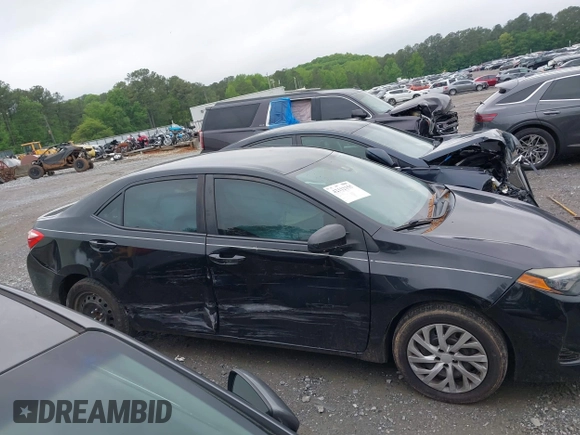 2018 Toyota Corolla L z VIN 5YFBURHE9JP765393, wystawiony jako IAAI lot #42112155 z przebiegiem 152 764 mil mil oraz . Historia ofert i sprzedaży dostępna na DreamBid. Obrazek 13.