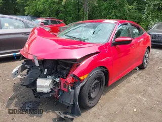2020 Honda Civic LX with VIN 2HGFC2F64LH586907, listed as a IAAI auction lot 42419728 with 61,288 mi miles and . Bid and sale history available at DreamBid. Image 2.