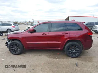 2019 Jeep Grand Cherokee Laredo E with VIN 1C4RJFAG1KC564325, listed as a IAAI auction lot 41359840 with 74,678 mi miles. Bid and sale history available at carsss.com. Image 14.