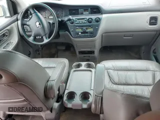 2004 Honda Odyssey EX-L with VIN 5FNRL18044B069774, listed as a Copart auction lot 57096535 with 165,307 mi miles and Salvage title. Bid and sale history available at DreamBid. Image 8.