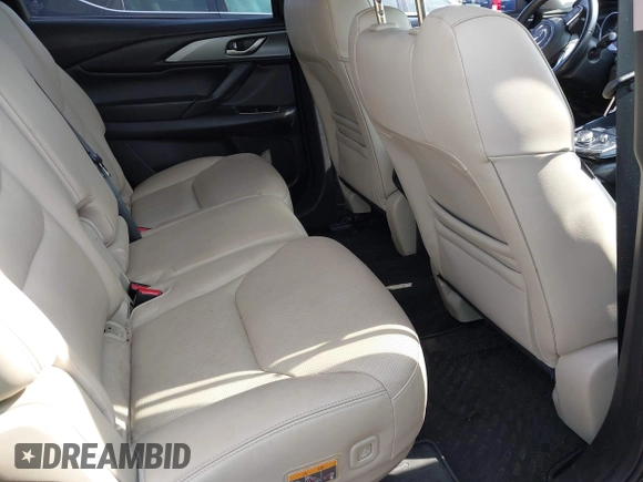 2021 Mazda CX-9 Touring with VIN JM3TCBCY7M0507699, listed as a IAAI auction lot 42603614 with 62,635 mi miles and . Bid and sale history available at DreamBid. Image 8.