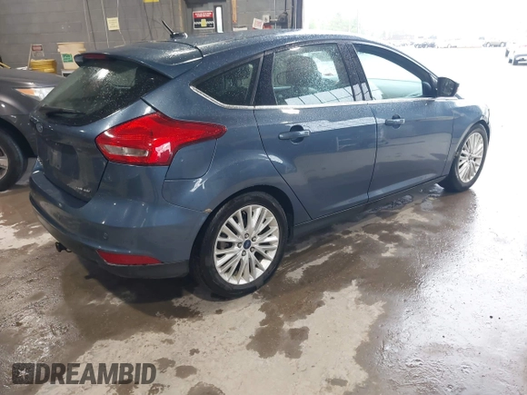 2018 Ford Focus Titanium with VIN 1FADP3N29JL242428, listed as a IAAI auction lot 42323967 with 200,662 mi miles and . Bid and sale history available at DreamBid. Image 4.