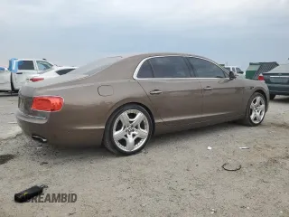 2014 Bentley Flying Spur с VIN SCBEC9ZA9EC091162, выставлен на аукционе Copart как лот 55941855 с пробегом 135 032 миль миль и Списание • Salvage title. История ставок и продаж доступна на DreamBid. Изображение 3.