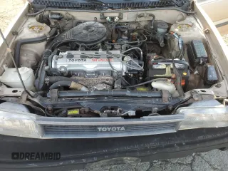 1988 Toyota Corolla z VIN JT2AE92E9J3106720, wystawiony jako Copart lot #78470924 z przebiegiem 161 927 mil mil oraz Szkoda całkowita • Salvage title. Historia ofert i sprzedaży dostępna na DreamBid. Obrazek 11.
