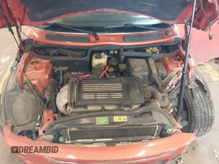 2005 MINI Convertible S with VIN WMWRH33455TK55035, listed as a IAAI auction lot 41936645 with 111,018 mi miles and . Bid and sale history available at DreamBid. Image 10.