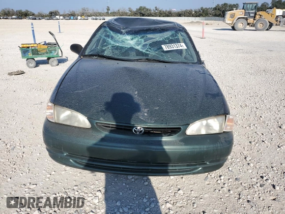 2000 Toyota Corolla VE with VIN 1NXBR12E5YZ387383, listed as a Copart auction lot 78931374 with 162,008 mi miles and Salvage title. Bid and sale history available at DreamBid. Image 5.