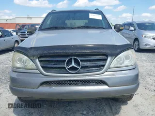 1998 Mercedes-Benz M-Class with VIN 4JGAB54E3WA031579, listed as a IAAI auction lot 42004335 with 156,898 mi miles. Bid and sale history available at carsss.com. Image 6.