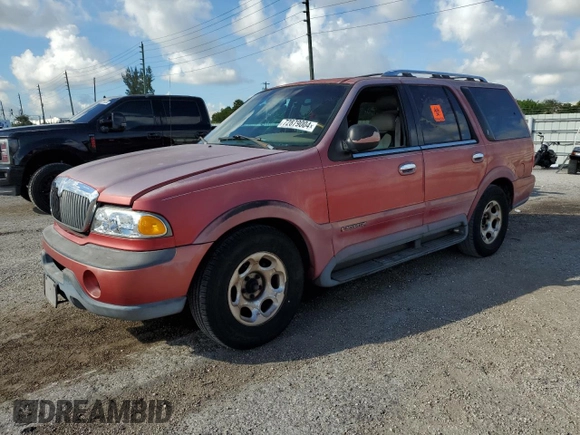 1999 Lincoln Navigator z VIN 5LMRU27A2XLJ41370, wystawiony jako Copart lot #72879004 z przebiegiem Nie podano mil oraz Szkoda całkowita • Salvage title. Historia ofert i sprzedaży dostępna na DreamBid. Obrazek 1.
