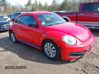 2013 Volkswagen Beetle Entry with VIN 3VWFP7AT8DM624961, listed as a IAAI auction lot 41772386 with 154,597 mi miles and . Bid and sale history available at DreamBid. Image 1.