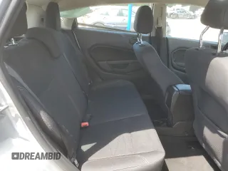 2019 Ford Fiesta SE z VIN 3FADP4EJ2KM142992, wystawiony jako Copart lot #55204795 z przebiegiem 98 018 mil mil oraz Szkody całkowita. Historia ofert i sprzedaży dostępna na DreamBid. Obrazek 10.
