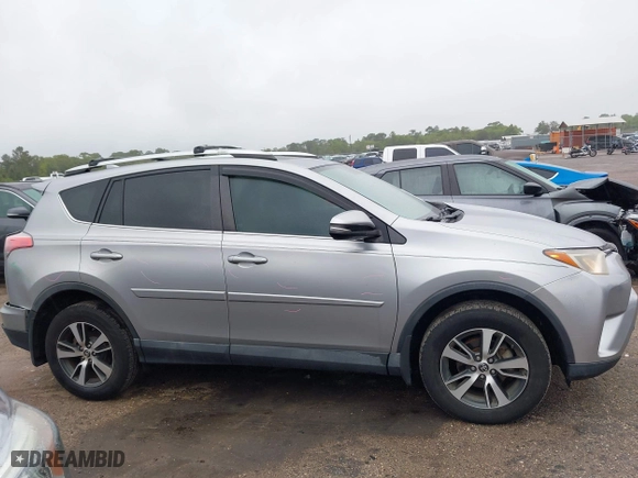 2016 Toyota RAV4 XLE with VIN 2T3WFREV5GW309468, listed as a IAAI auction lot 41973896 with 100,911 mi miles. Bid and sale history available at carsss.com. Image 13.