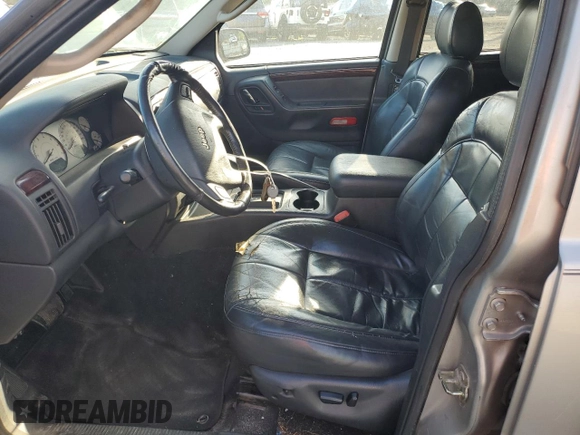 2002 Jeep Grand Cherokee Limited with VIN 1J4GX58S32C149852, listed as a Copart auction lot 71655864 with 190,918 mi miles and Salvage Title. Bid and sale history available at DreamBid. Image 7.