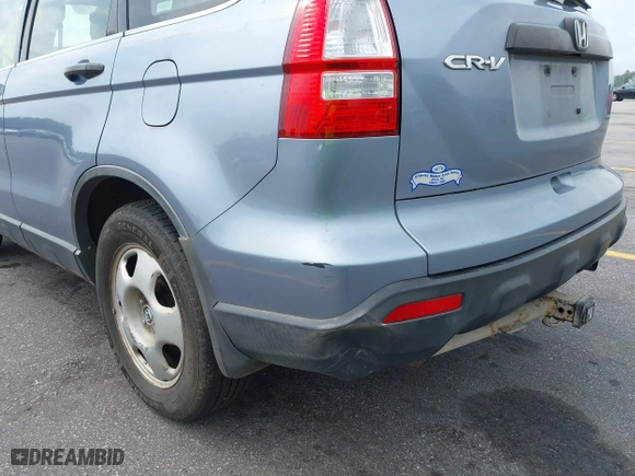 2007 Honda CR-V LX with VIN JHLRE48317C057561, listed as a IAAI auction lot 42119266 with 307,373 mi miles. Bid and sale history available at carsss.com. Image 13.