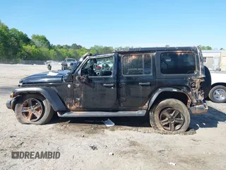 2019 Jeep Wrangler Unlimited Sport S with VIN 1C4HJXDG7KW671598, listed as a IAAI auction lot 42059734 with 63,899 mi miles and . Bid and sale history available at DreamBid. Image 14.