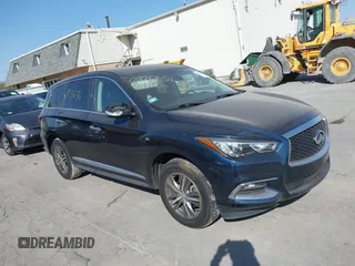 2020 Infiniti QX60 LUXE with VIN 5N1DL0MMXLC515463, listed as a IAAI auction lot 40556558 with 77,526 mi miles. Bid and sale history available at carsss.com. Image 1.
