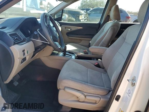 2019 Honda Pilot LX with VIN 5FNYF5H12KB006768, listed as a Copart auction lot 43393665 with 59,121 mi miles and Salvage Title. Bid and sale history available at DreamBid. Image 7.
