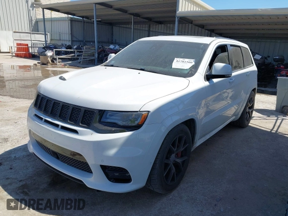2017 Jeep Grand Cherokee SRT with VIN 1C4RJFDJ0HC699537, listed as a IAAI auction lot 41781500 with 105,640 mi miles. Bid and sale history available at carsss.com. Image 17.