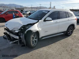 2018 BMW X1 sDrive28i with VIN WBXHU7C35J5H42829, listed as a Copart auction lot 85746804 with 101,671 mi miles and Salvage Title. Bid and sale history available at carsss.com. Image 1.