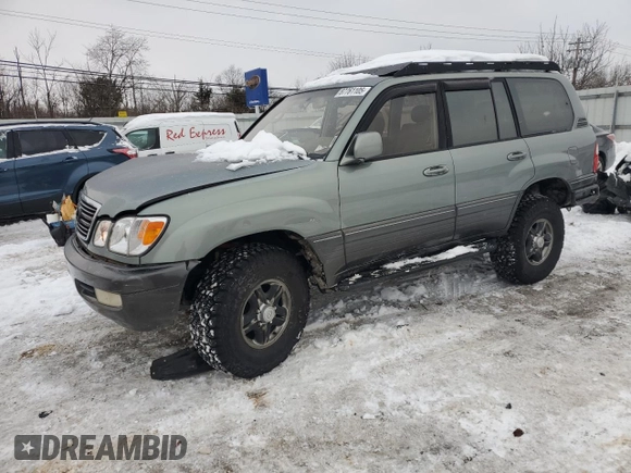 2002 Lexus LX 470 z VIN JTJHT00W923514121, wystawiony jako Copart lot #87761105 z przebiegiem 247 752 mil mil oraz Szkody całkowita. Historia ofert i sprzedaży dostępna na DreamBid. Obrazek 1.