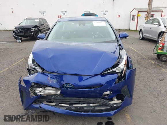 2018 Toyota Prius Two with VIN JTDKBRFU8J3067821, listed as a IAAI auction lot 41767013 with 82,285 mi miles and . Bid and sale history available at carsss.com. Image 12.