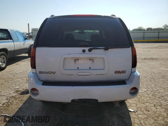 2005 GMC Envoy SLT with VIN 1GKDT13S852185958, listed as a Copart auction lot 68736194 with 225,398 mi miles and Salvage Title. Bid and sale history available at DreamBid. Image 6.