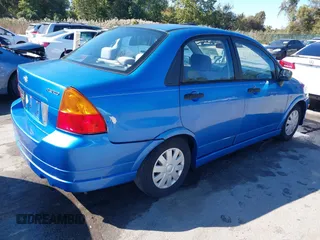 2003 Suzuki Aerio S z VIN JS2RA41SX35171394, wystawiony jako IAAI lot #40612266 z przebiegiem 70 127 mil mil oraz . Historia ofert i sprzedaży dostępna na DreamBid. Obrazek 4.