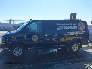 2016 Chevrolet Express Cargo Van with VIN 1GCWGAFF0G1154459, listed as a IAAI auction lot 41647930 with 100,142 mi miles. Bid and sale history available at carsss.com. Image 14.