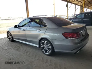 2014 Mercedes-Benz E 350 Sport with VIN WDDHF5KB5EA939150, listed as a Copart auction lot 60912775 with 121,764 mi miles and Salvage title. Bid and sale history available at DreamBid. Image 2.