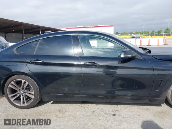 2015 BMW 4 Series 428i z VIN WBA4A9C5XFD416873, wystawiony jako IAAI lot #42108645 z przebiegiem 93 433 mil mil oraz . Historia ofert i sprzedaży dostępna na DreamBid. Obrazek 14.