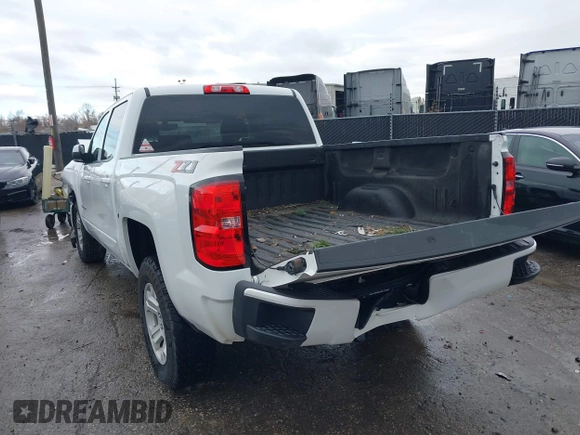 2018 Chevrolet Silverado 1500 LT with VIN 3GCUKREC3JG453433, listed as a IAAI auction lot 38138441 with 53,496 mi miles. Bid and sale history available at carsss.com. Image 3.